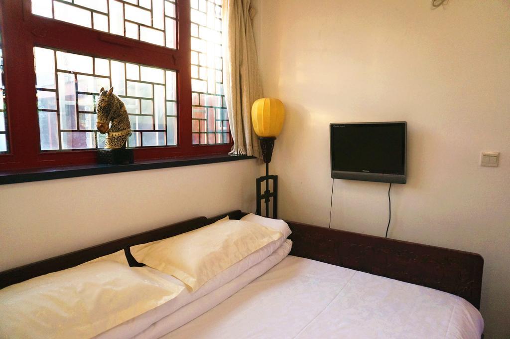 Templeside Deluxe Hutong Hotel Peking Zimmer foto