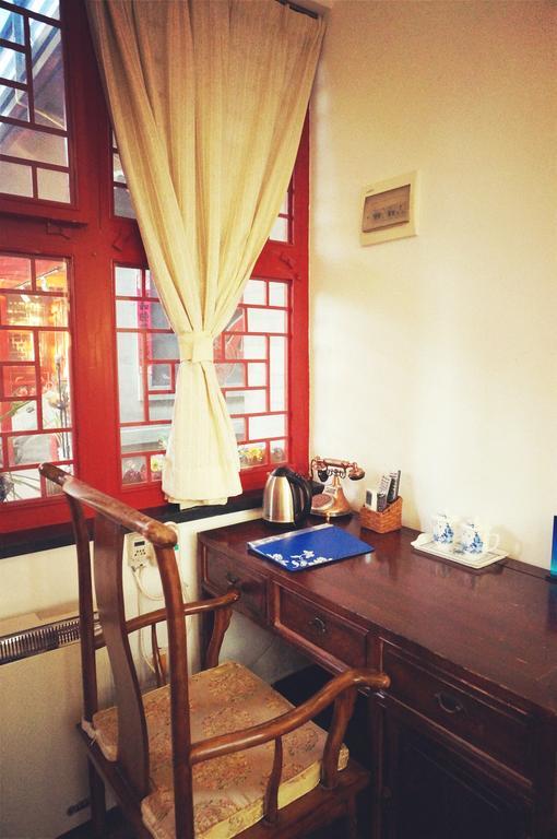 Templeside Deluxe Hutong Hotel Peking Zimmer foto