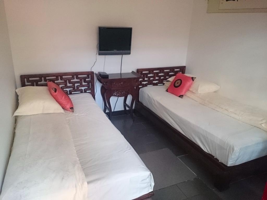 Templeside Deluxe Hutong Hotel Peking Zimmer foto