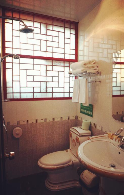 Templeside Deluxe Hutong Hotel Peking Zimmer foto